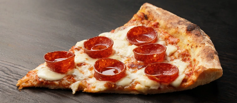This cured meat curls into crispy, oil-filled cups when baked on a New York slice.