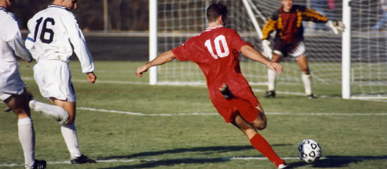 Take a bite out of this athletic classic—can you name the sport being played here?