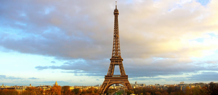 Let's start our feast with the towering iron landmark known as the Eiffel Tower—which nation does it call home?